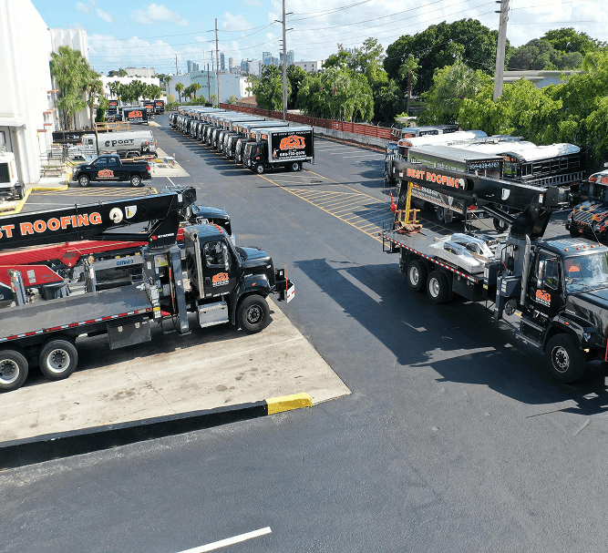 Best Roofing fleet of trucks and crane trucks at headquarters